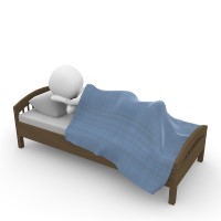 Das Bild zeigt einen stilisierten Menschen, der zugedeckt in einem Bett schläft, Quelle: Pixabay